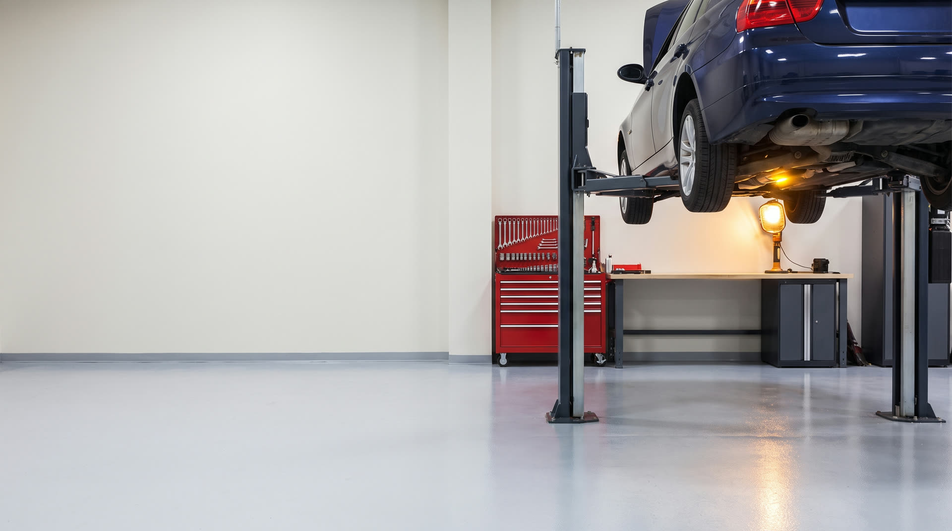 Trueline Auto Care service bay with a car on the lift